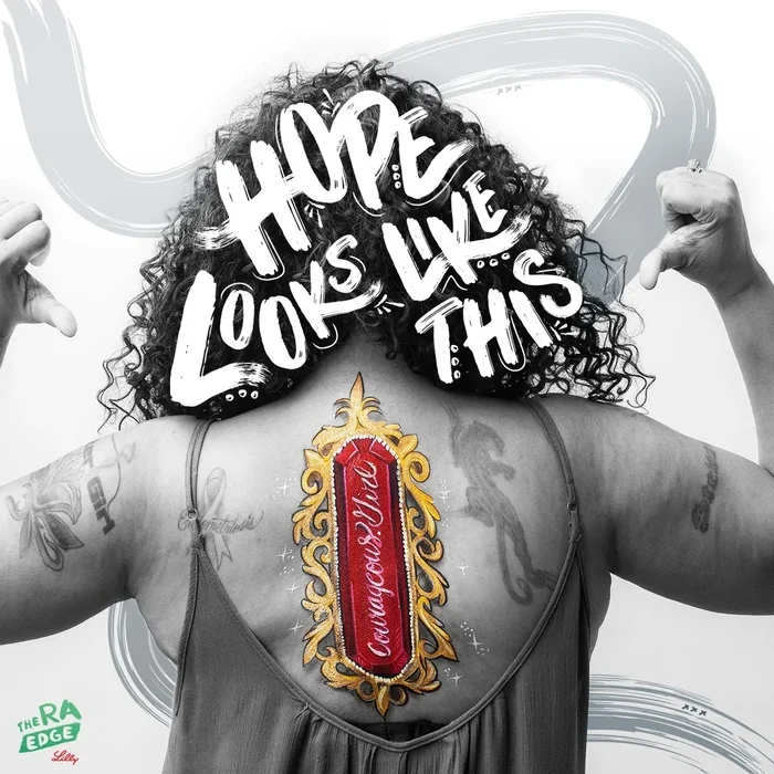 A woman with Hope Looks Like This lettered across her hair and back